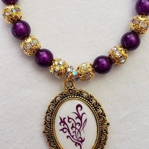 Vintage style YOUNIQUE charm bracelet